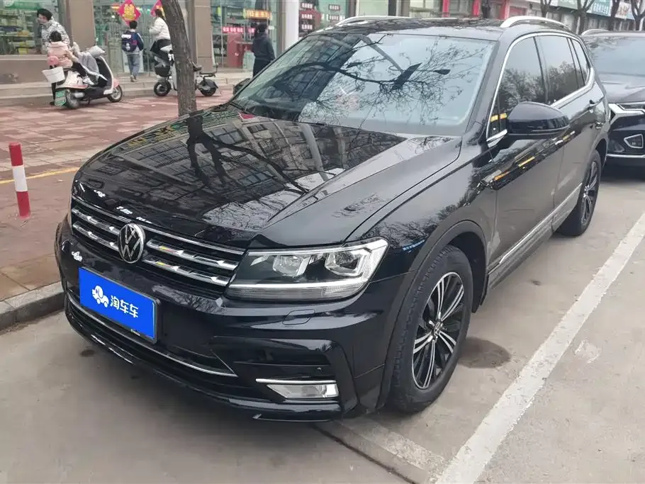 Volkswagen Tiguan L — фото 1