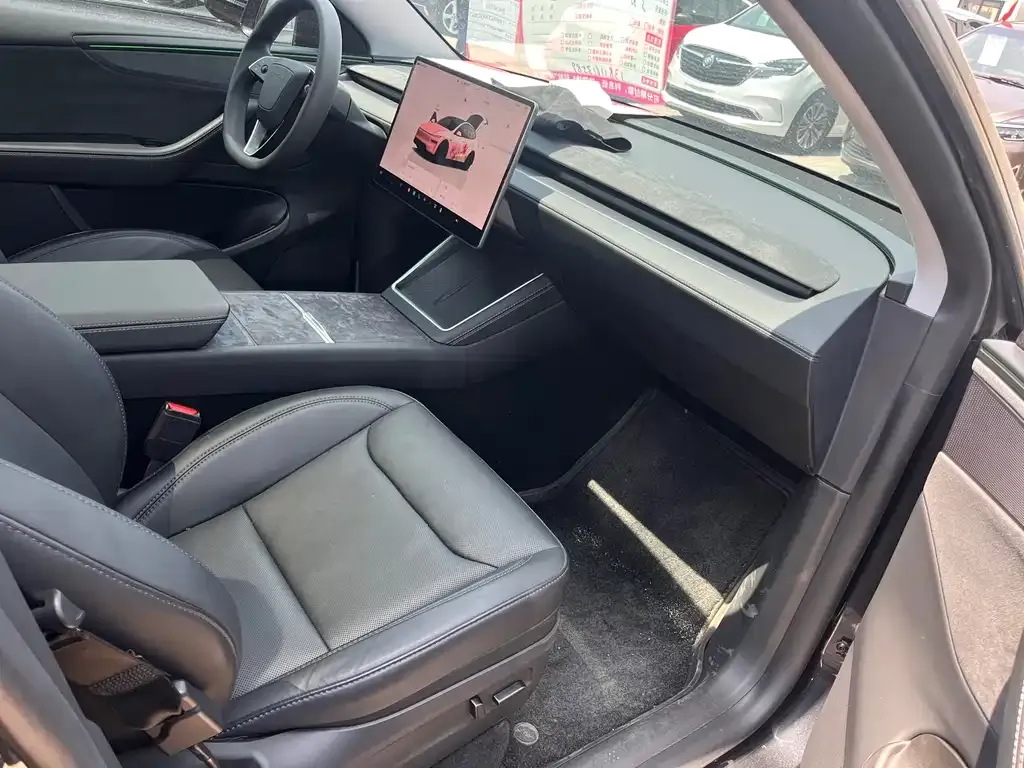 Tesla Model Y — фото 7