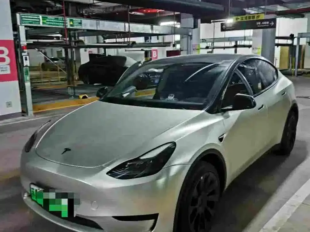 Tesla Model Y — фото 1
