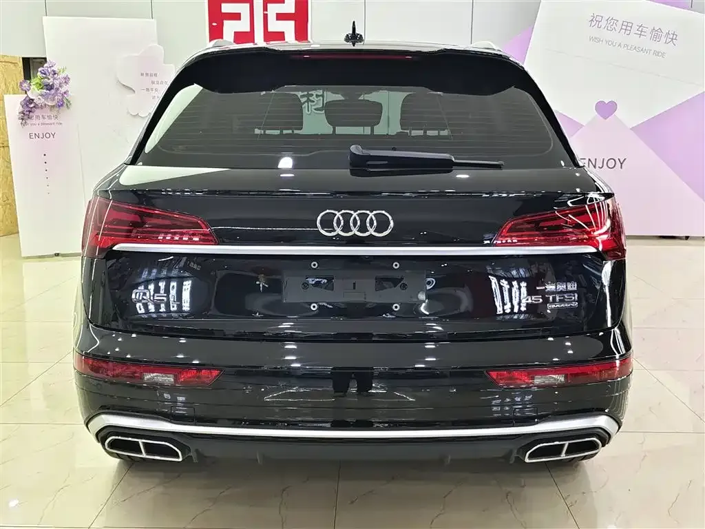 Audi Q5L — фото 10