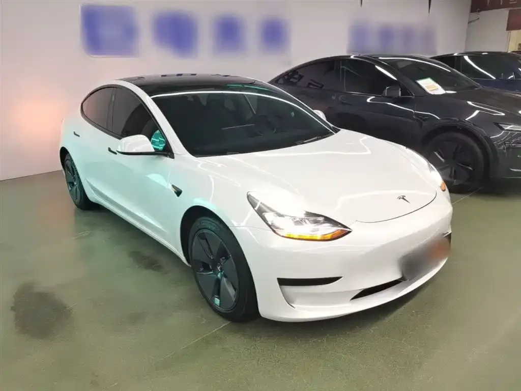 Tesla Model 3 — фото 7