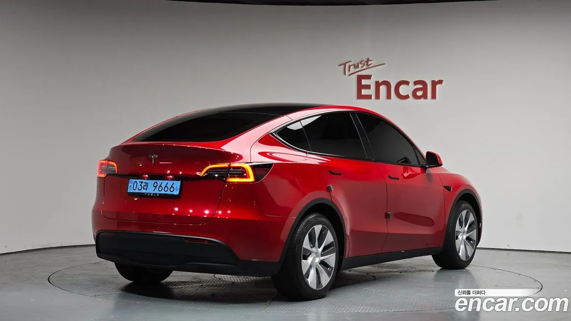 Tesla Model Y — фото 5