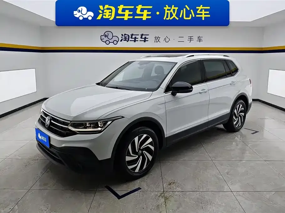 Volkswagen Tiguan L — фото 1