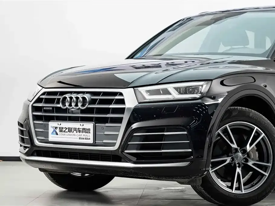 Audi Q5L — фото 8