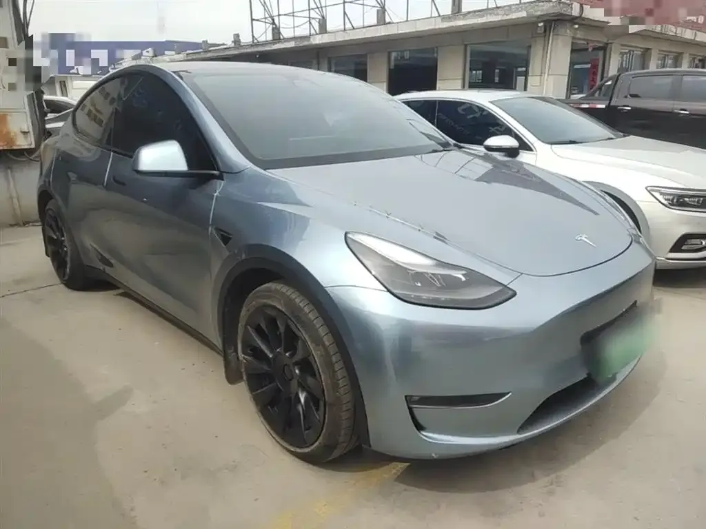 Tesla Model Y — фото 10