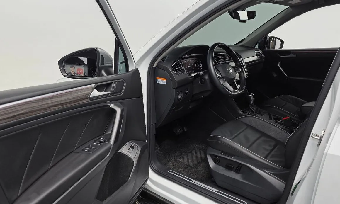 Volkswagen Tiguan — фото 7