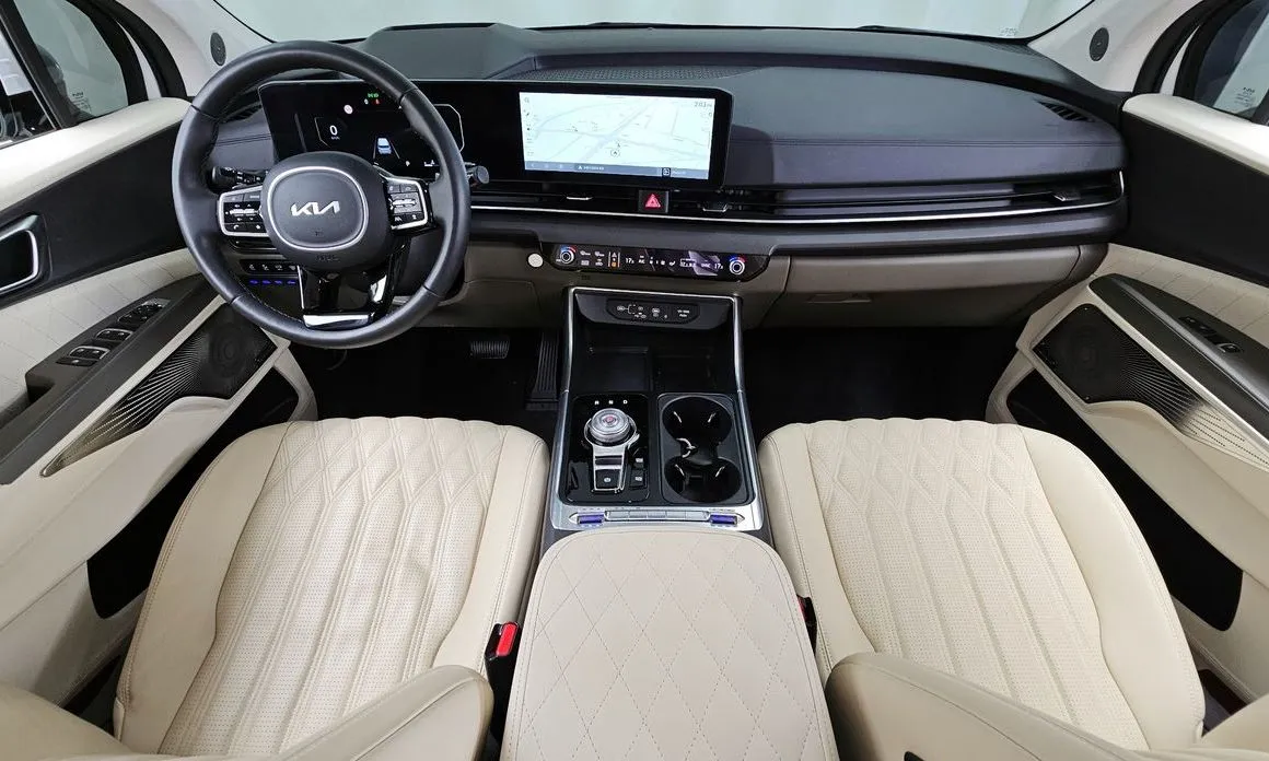 Kia Carnival — фото 10
