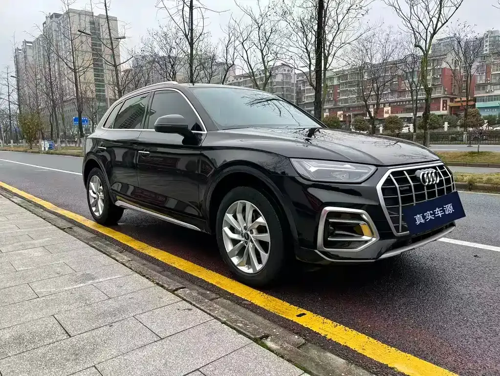 Audi Q5L — фото 10