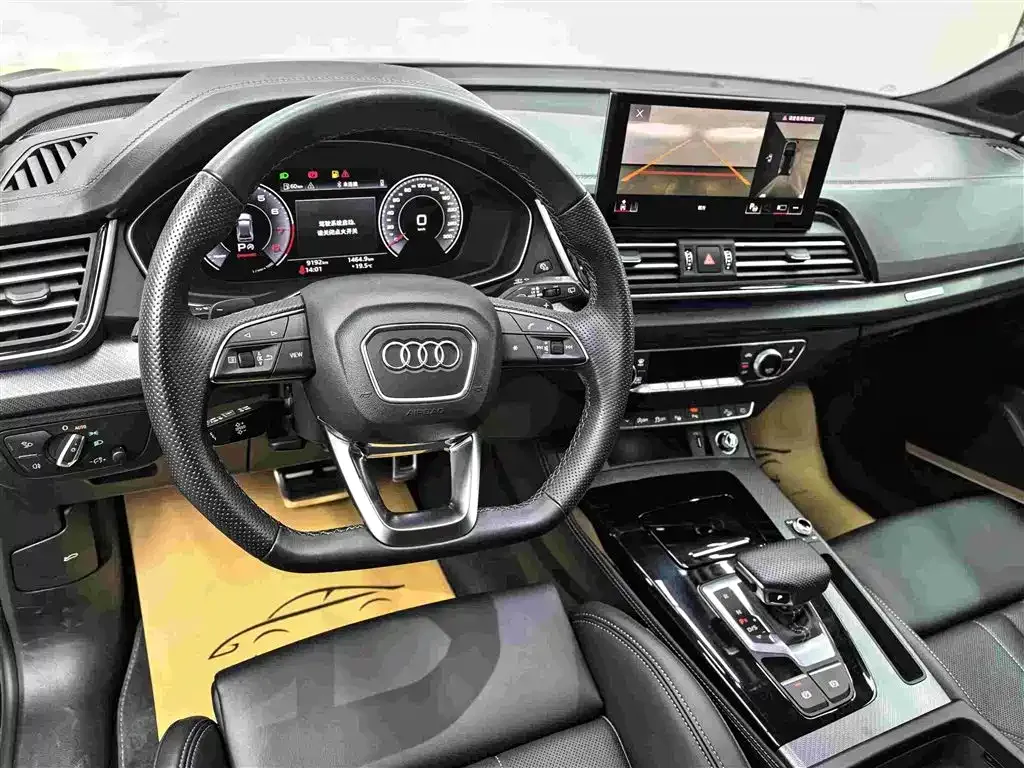 Audi Q5L — фото 9