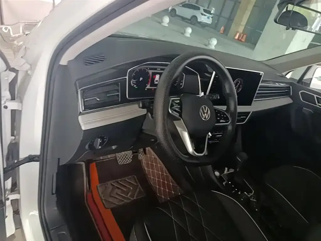 Volkswagen Tiguan L — фото 5