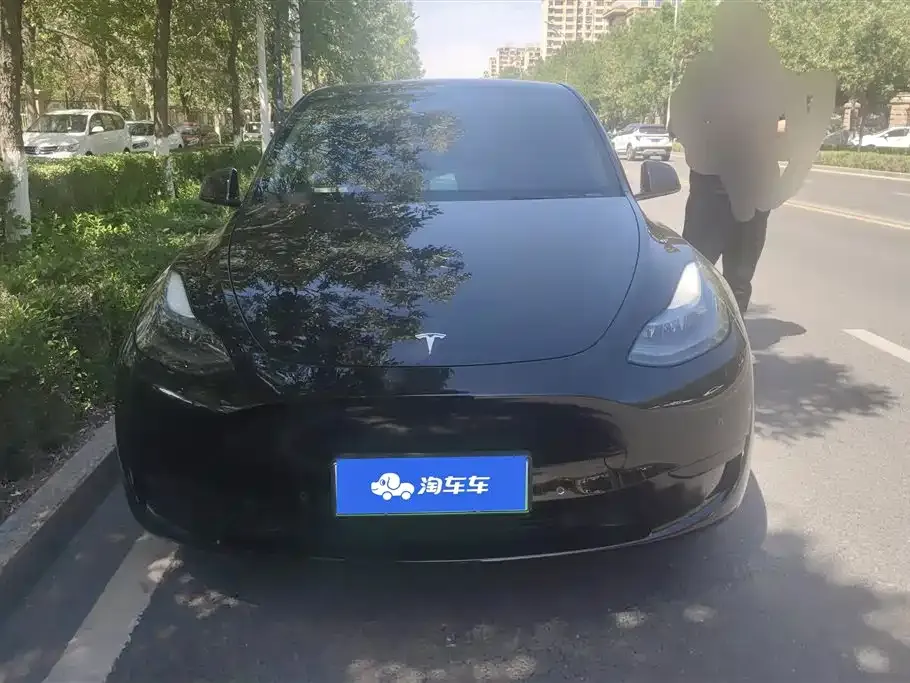 Tesla Model Y — фото 10