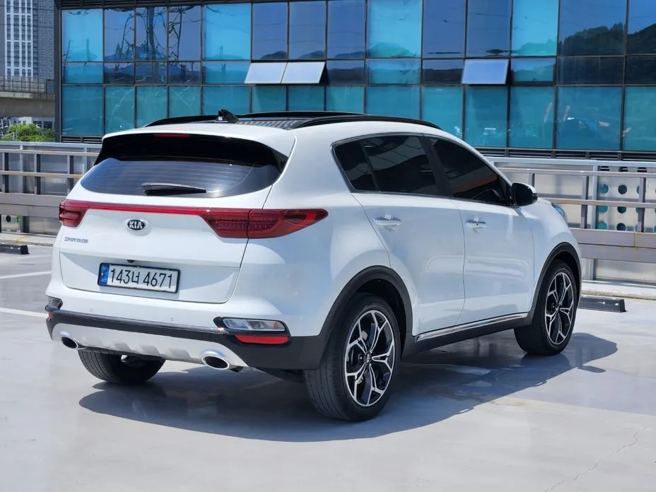Kia Sportage — фото 8