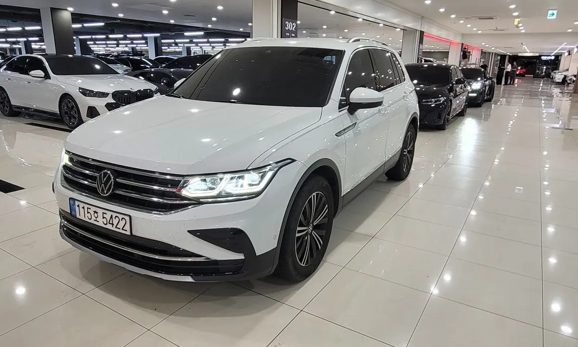 Volkswagen Tiguan — фото 1