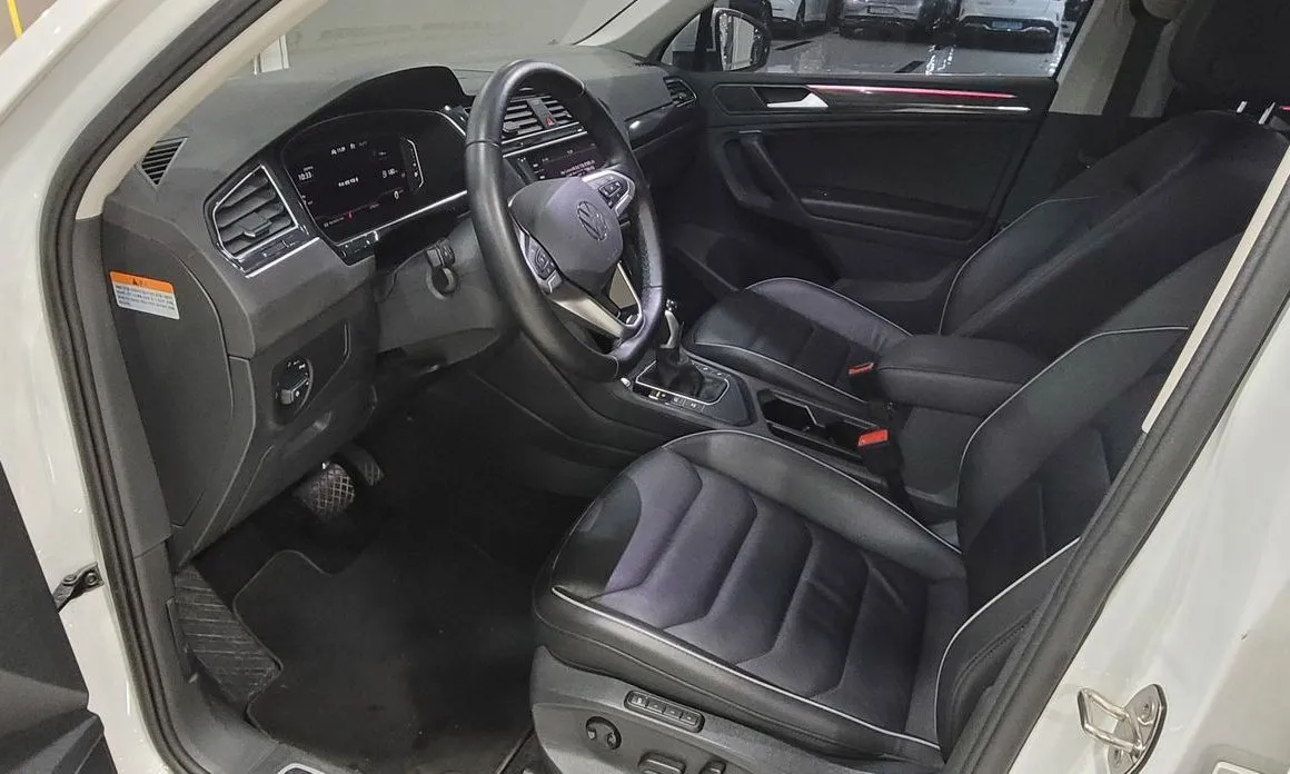 Volkswagen Tiguan — фото 8