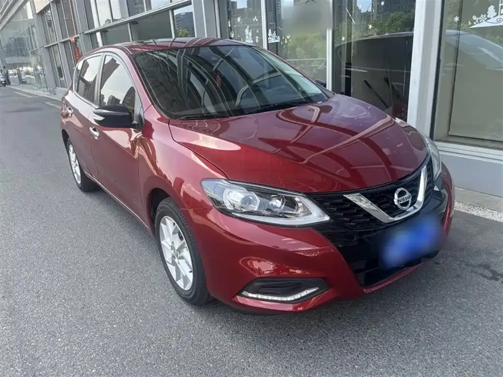 Nissan Tiida — фото 10
