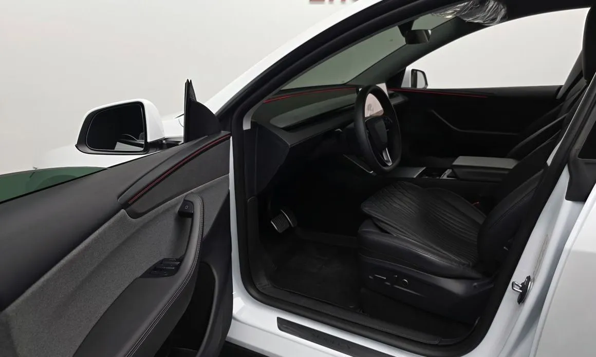 Tesla Model Y — фото 7