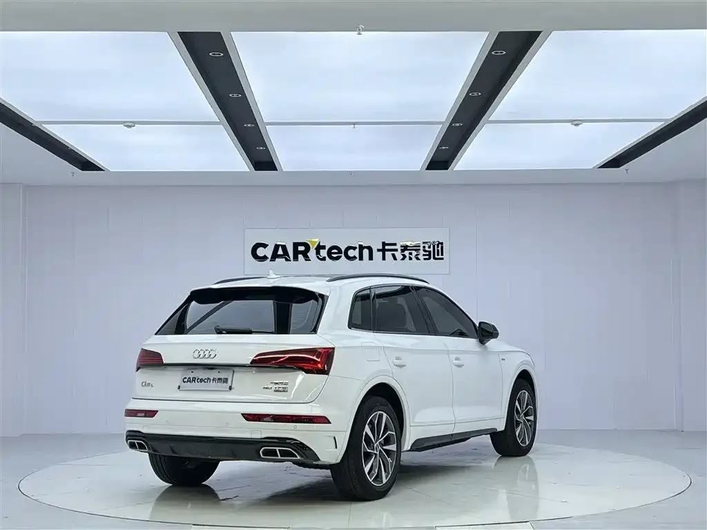 Audi Q5L — фото 8