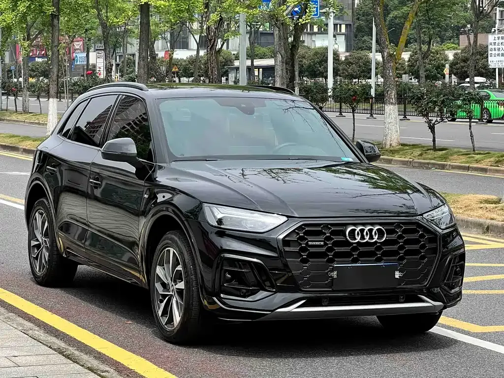 Audi Q5L — фото 10