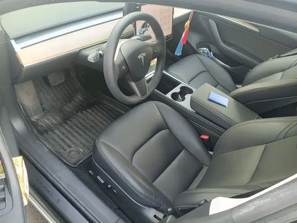 Tesla Model 3 — фото 10