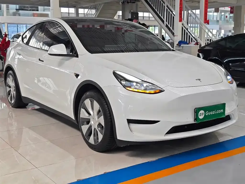 Tesla Model Y — фото 7