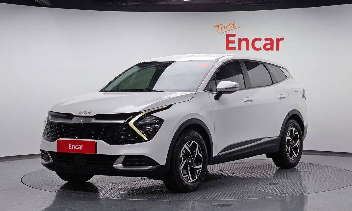 Kia Sportage — фото 1