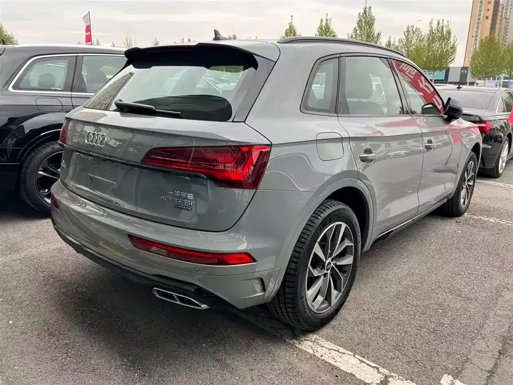 Audi Q5L — фото 10