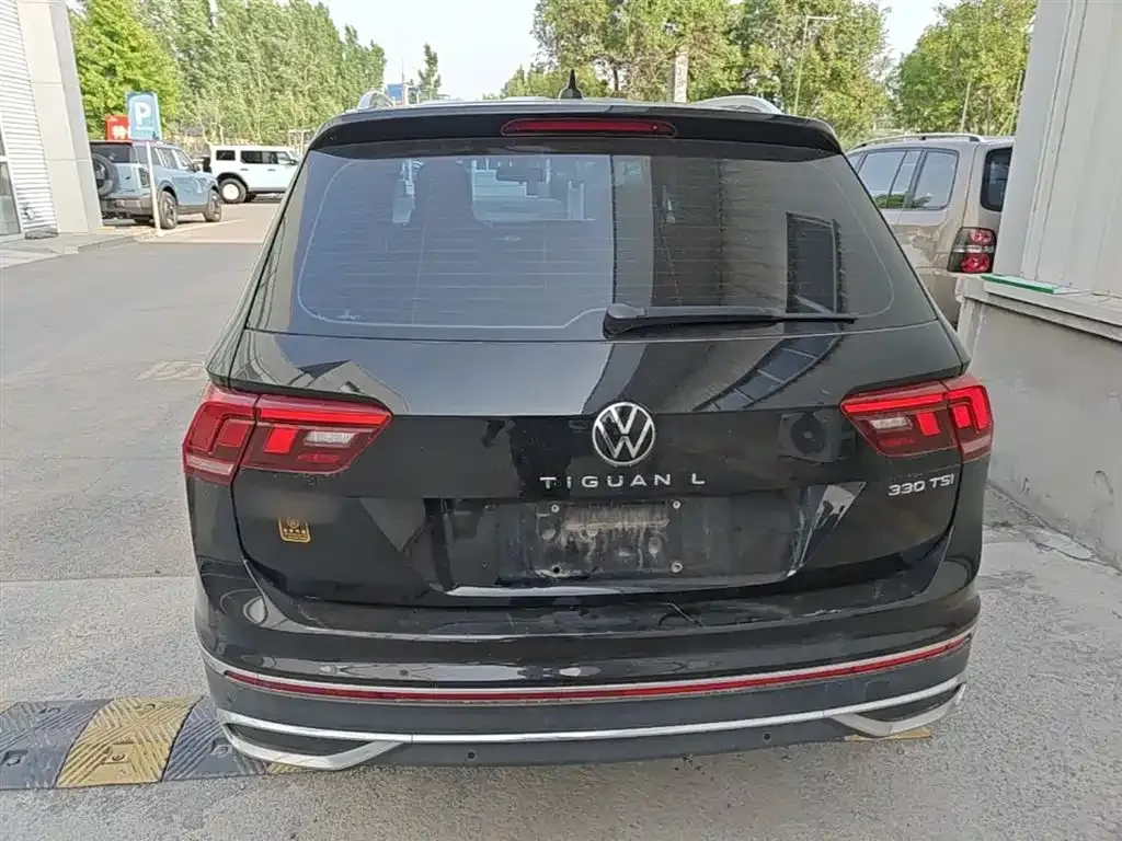 Volkswagen Tiguan L — фото 5