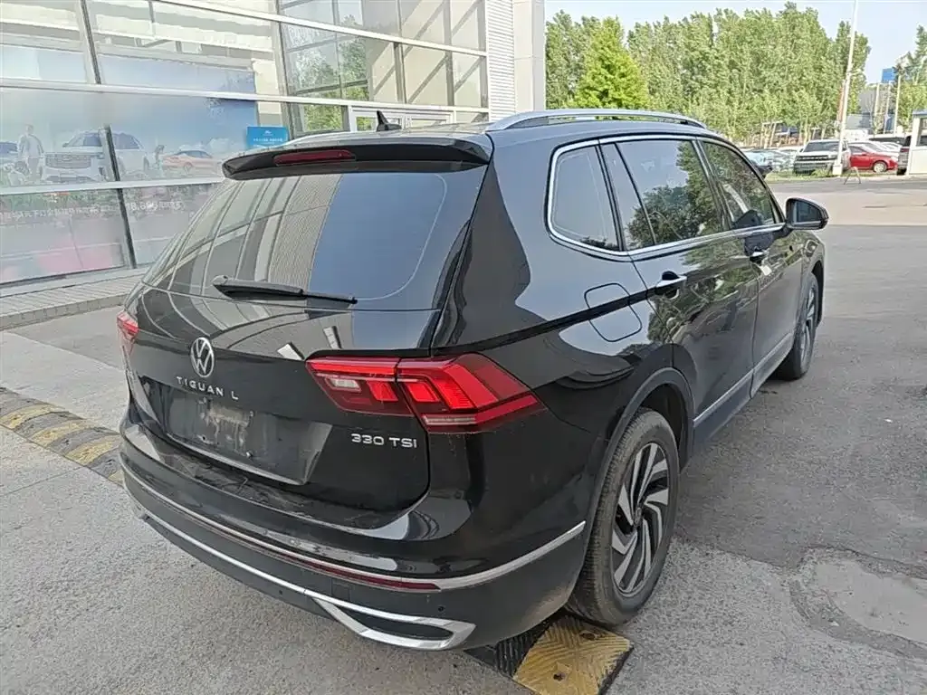 Volkswagen Tiguan L — фото 9