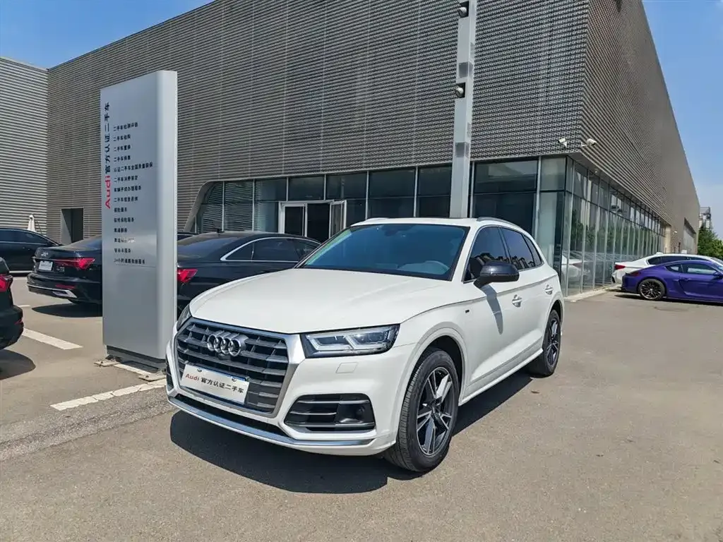 Audi Q5L — фото 8