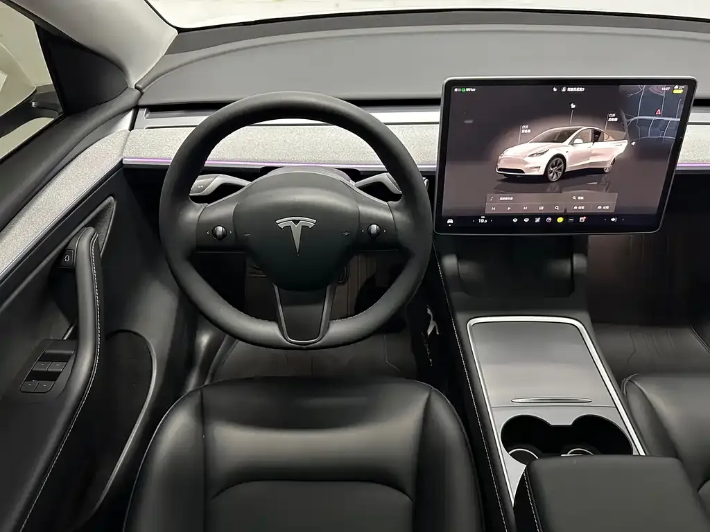 Tesla Model Y — фото 7