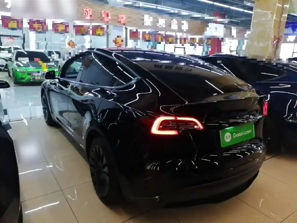 Tesla Model Y — фото 9