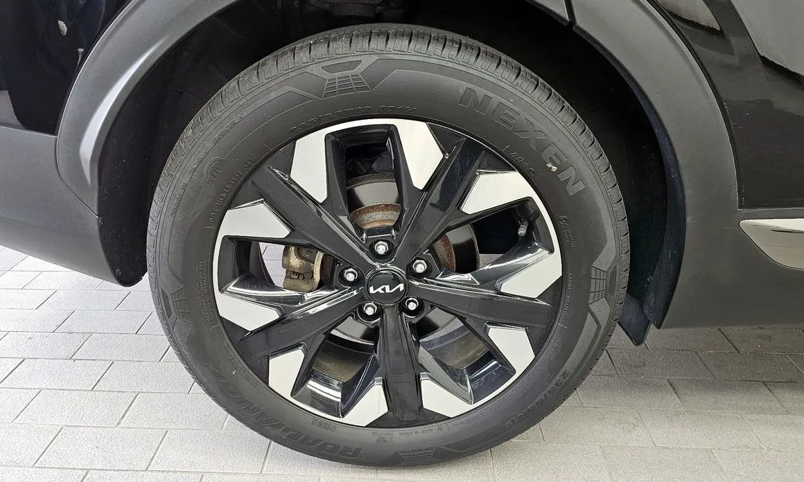 Kia Sportage — фото 8