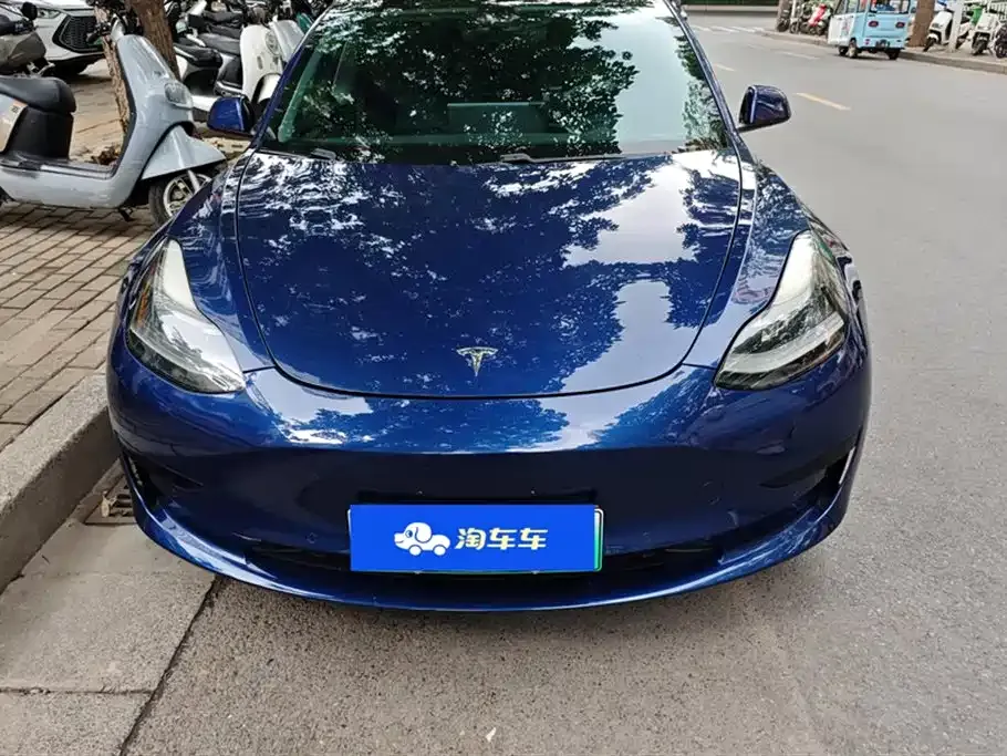 Tesla Model 3 — фото 10