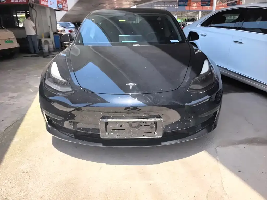 Tesla Model 3 — фото 6