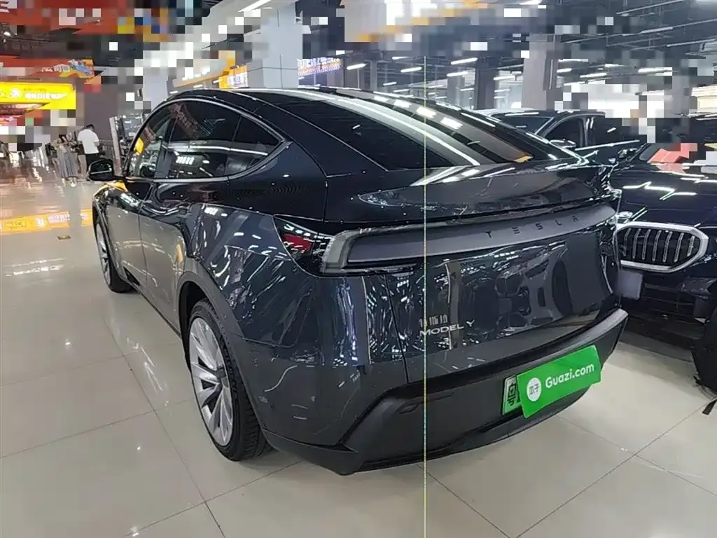 Tesla Model Y — фото 10