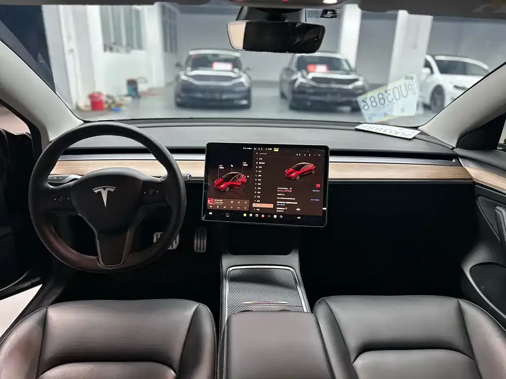 Tesla Model 3 — фото 7
