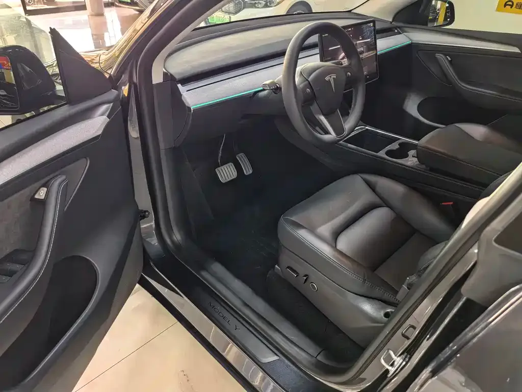 Tesla Model Y — фото 7