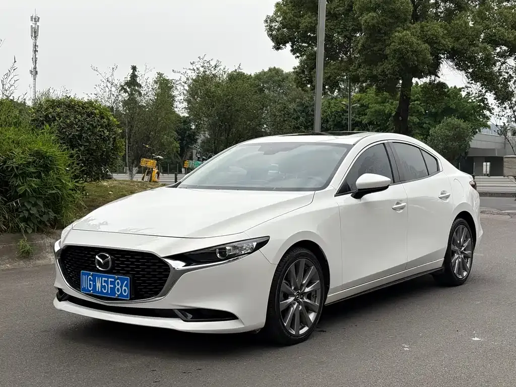 Mazda 3 Axela — фото 1