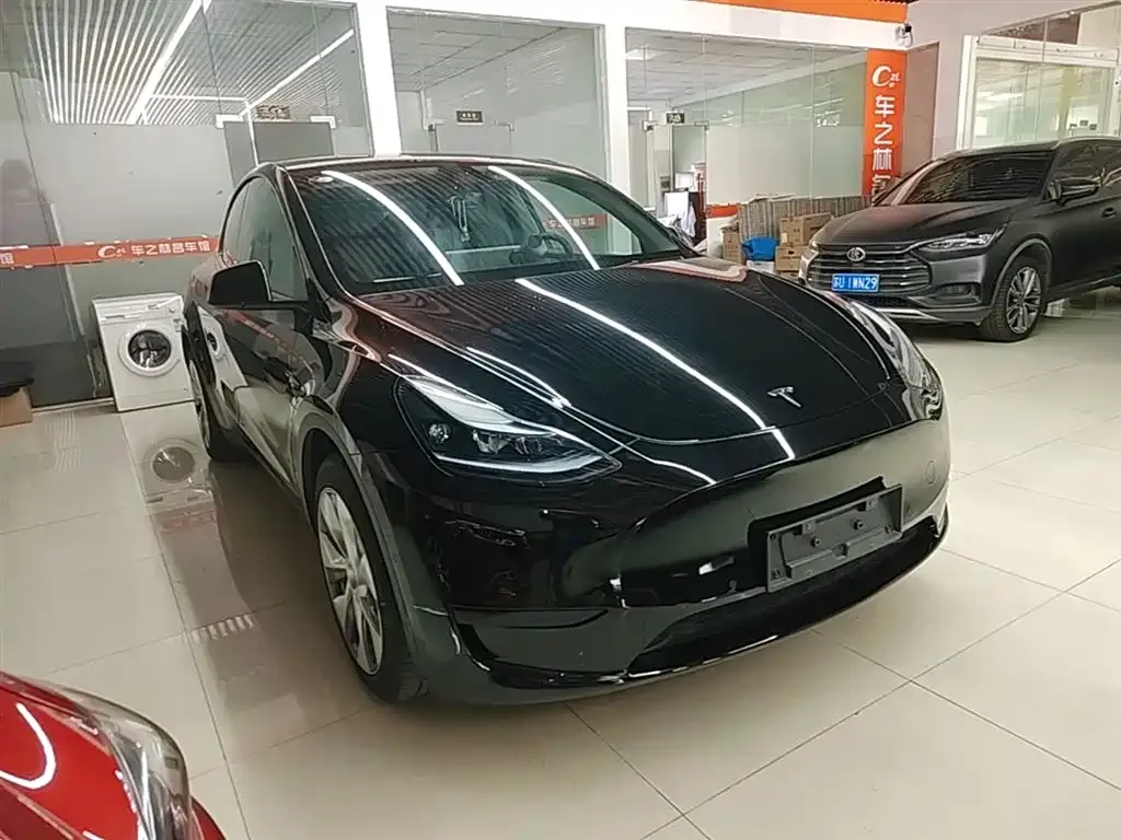Tesla Model Y — фото 10