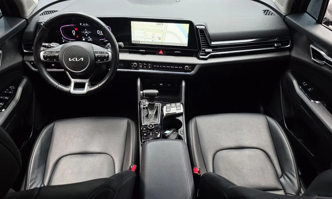 Kia Sportage — фото 10