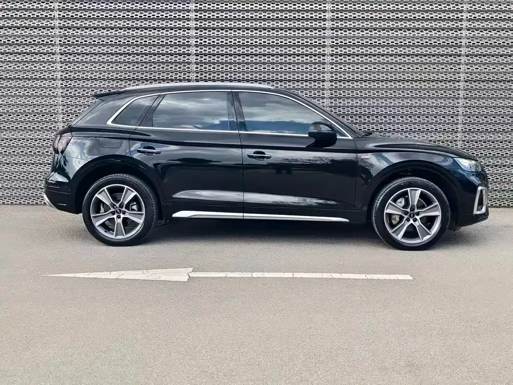 Audi Q5L — фото 7