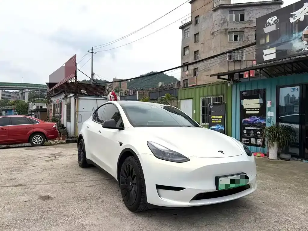 Tesla Model Y — фото 7