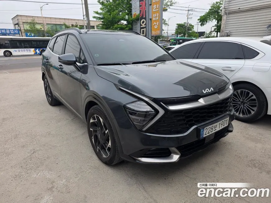 Kia Sportage — фото 1