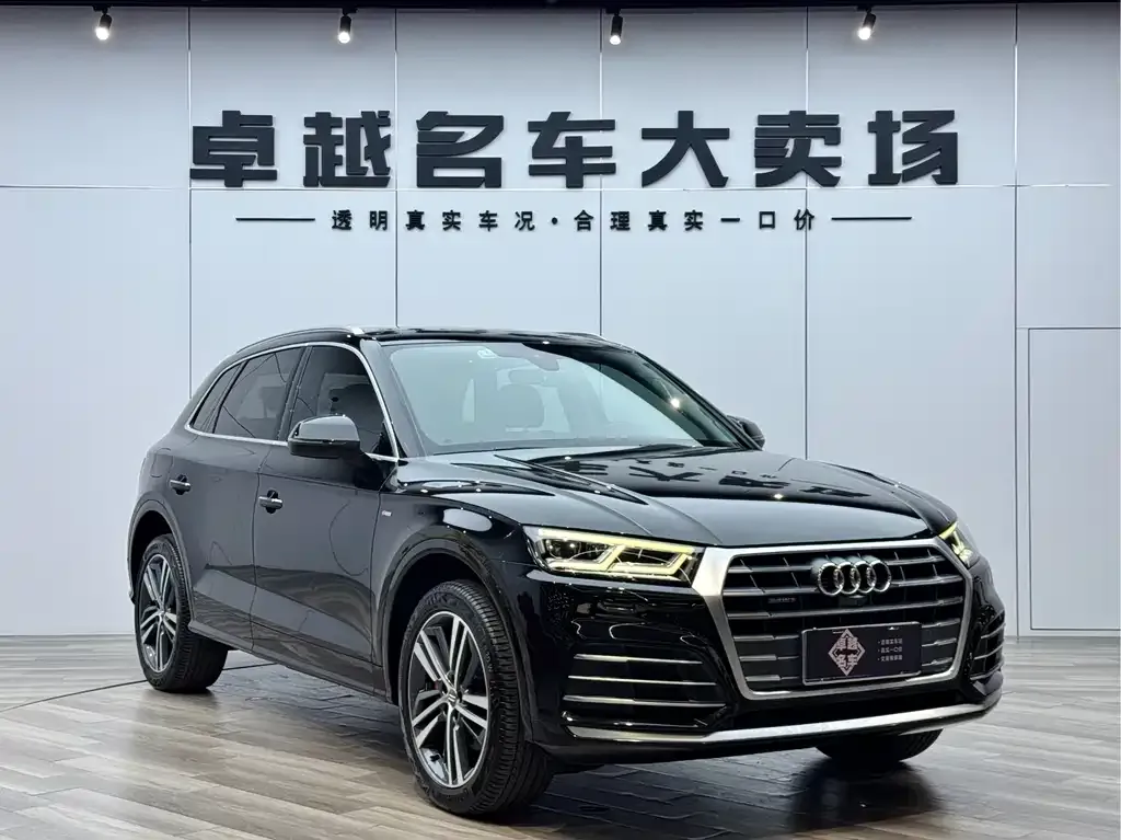 Audi Q5L — фото 10