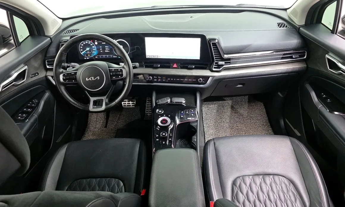 Kia Sportage — фото 10