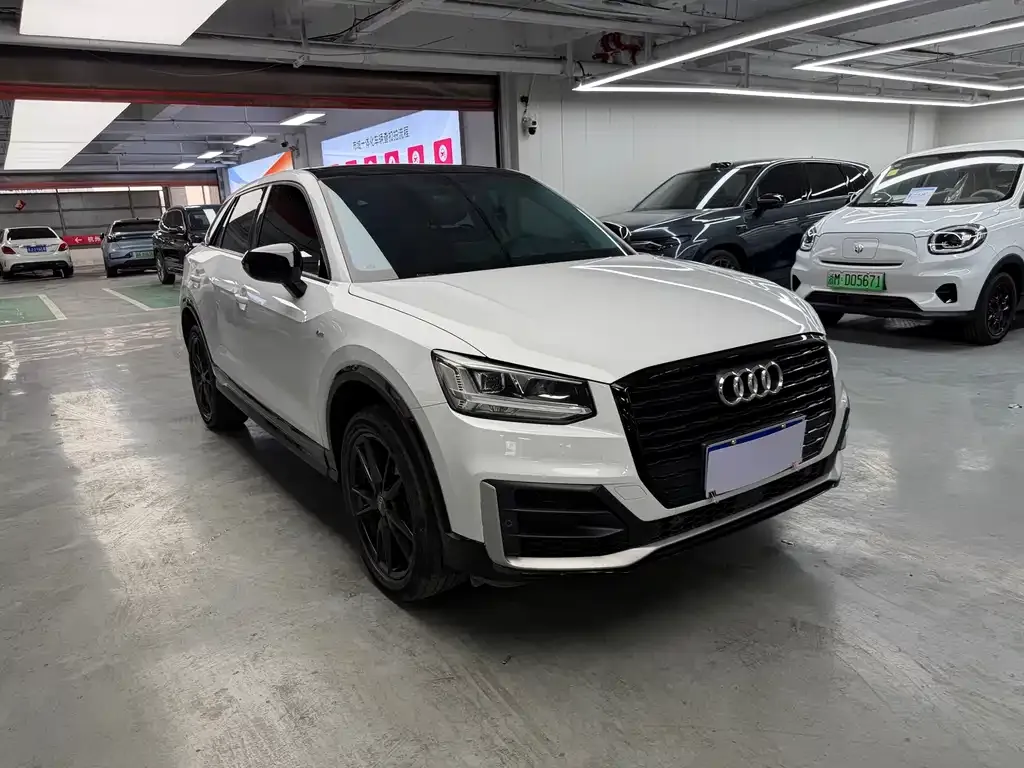 Audi Q2L — фото 4