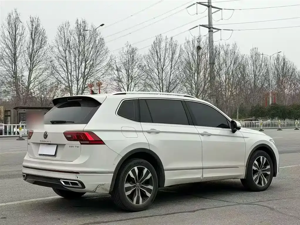 Volkswagen Tiguan L — фото 10