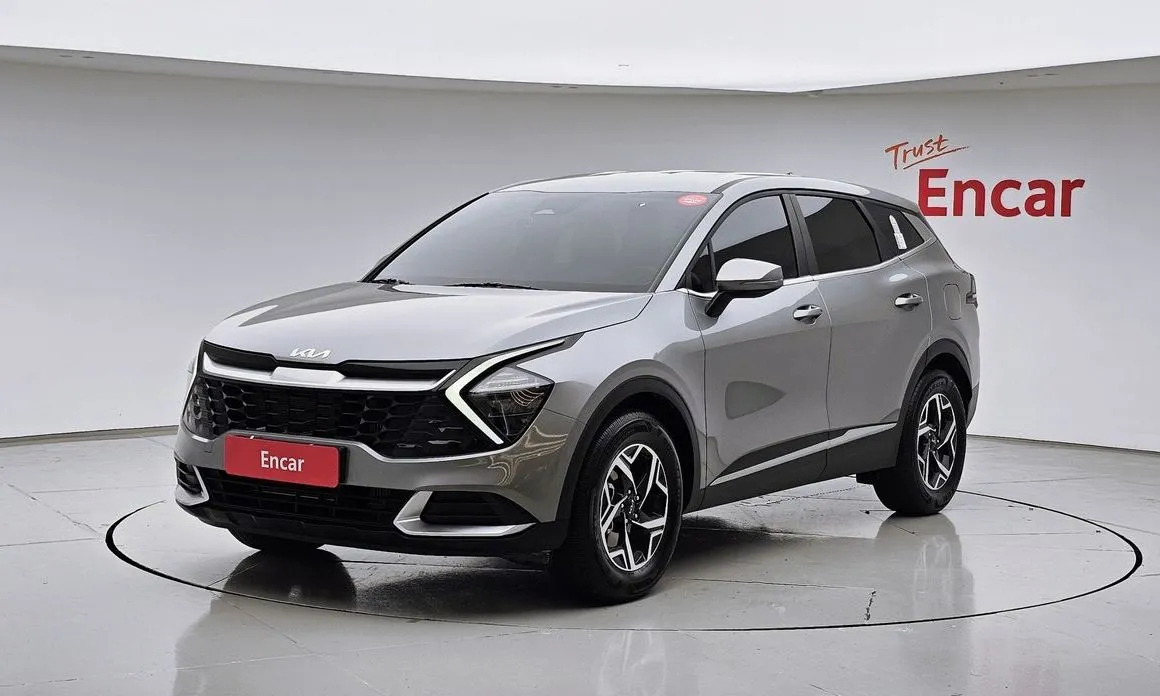 Kia Sportage — фото 1