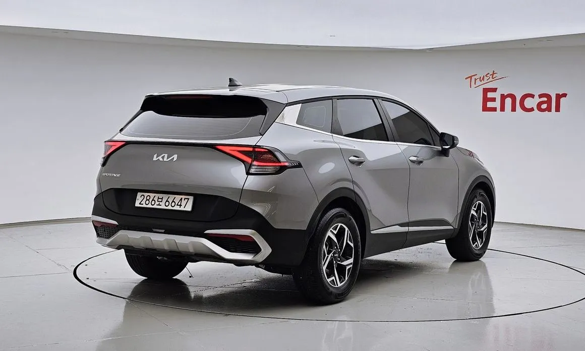 Kia Sportage — фото 10