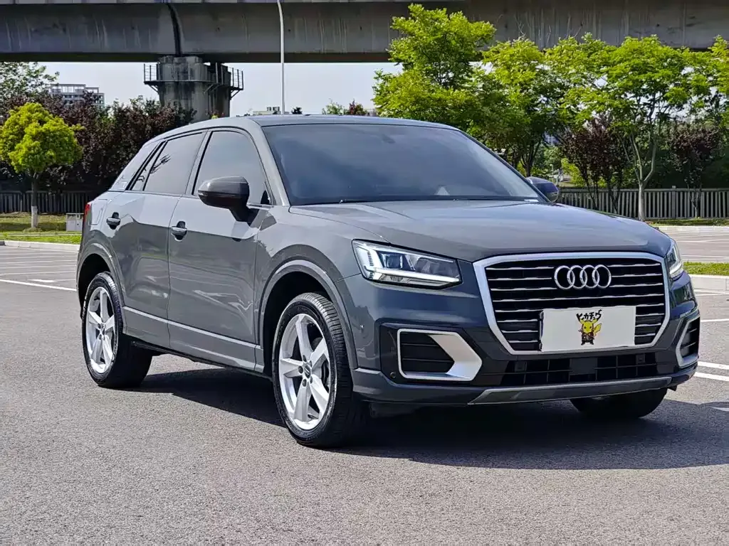 Audi Q2L — фото 5